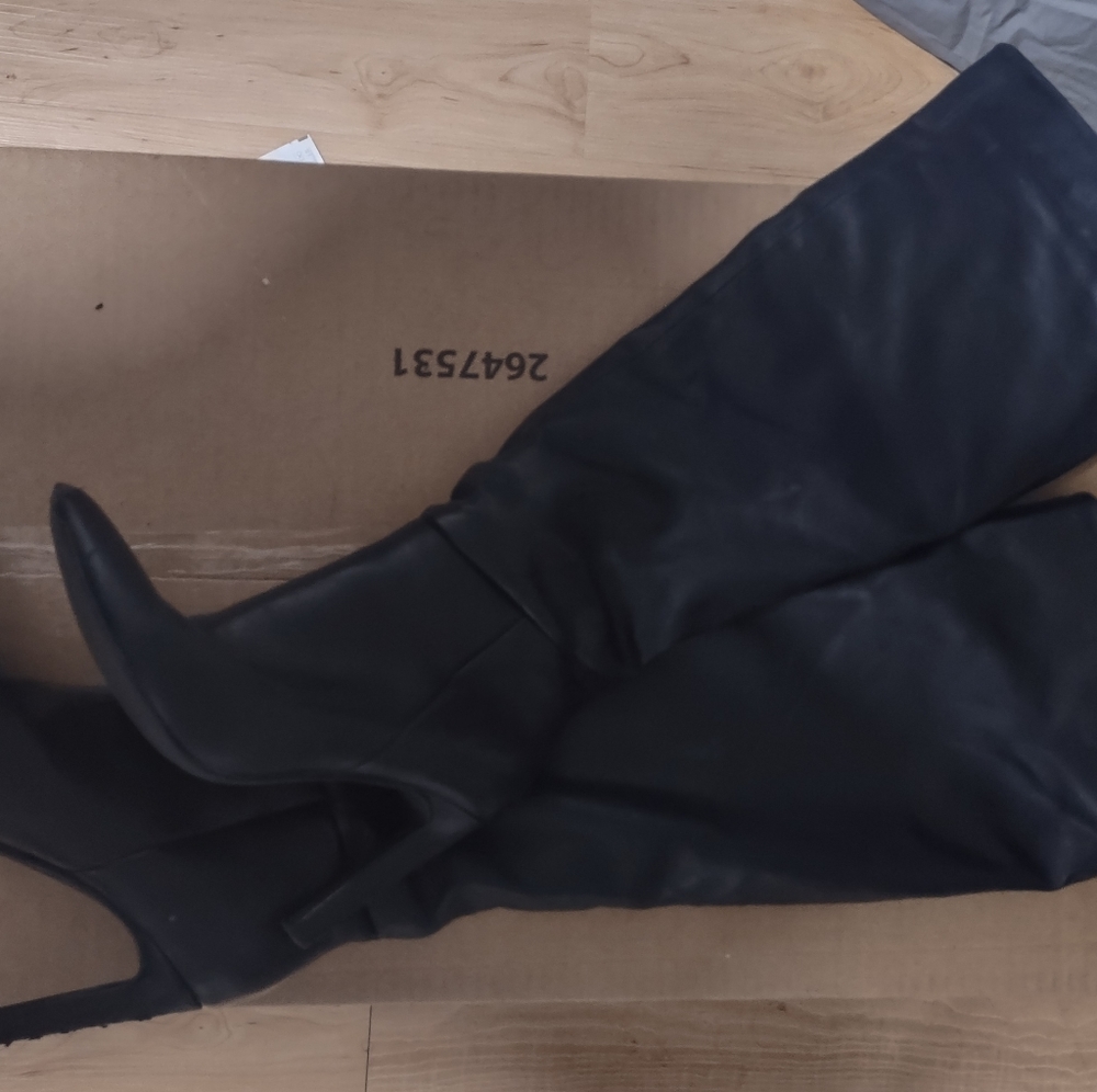 Tall black boots